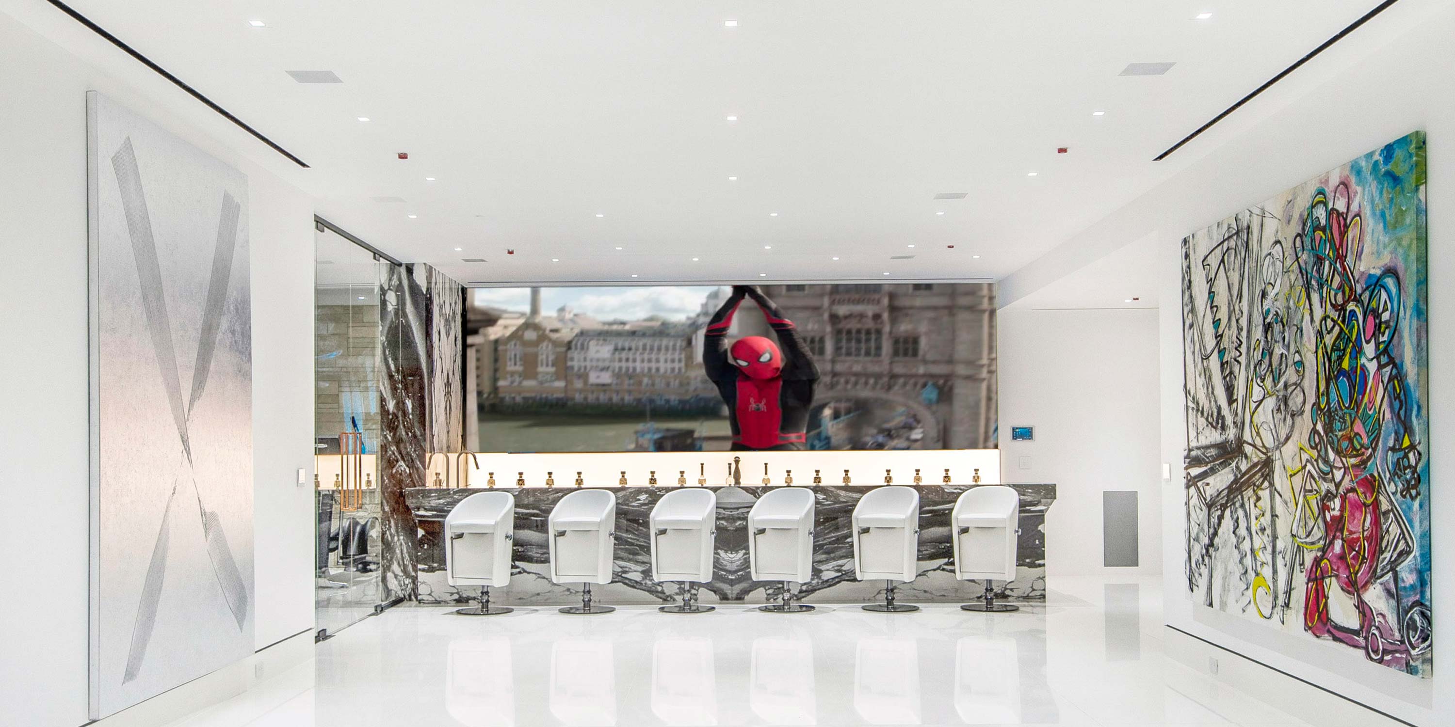 Clean garage with white floors and ceilings and LED lighting