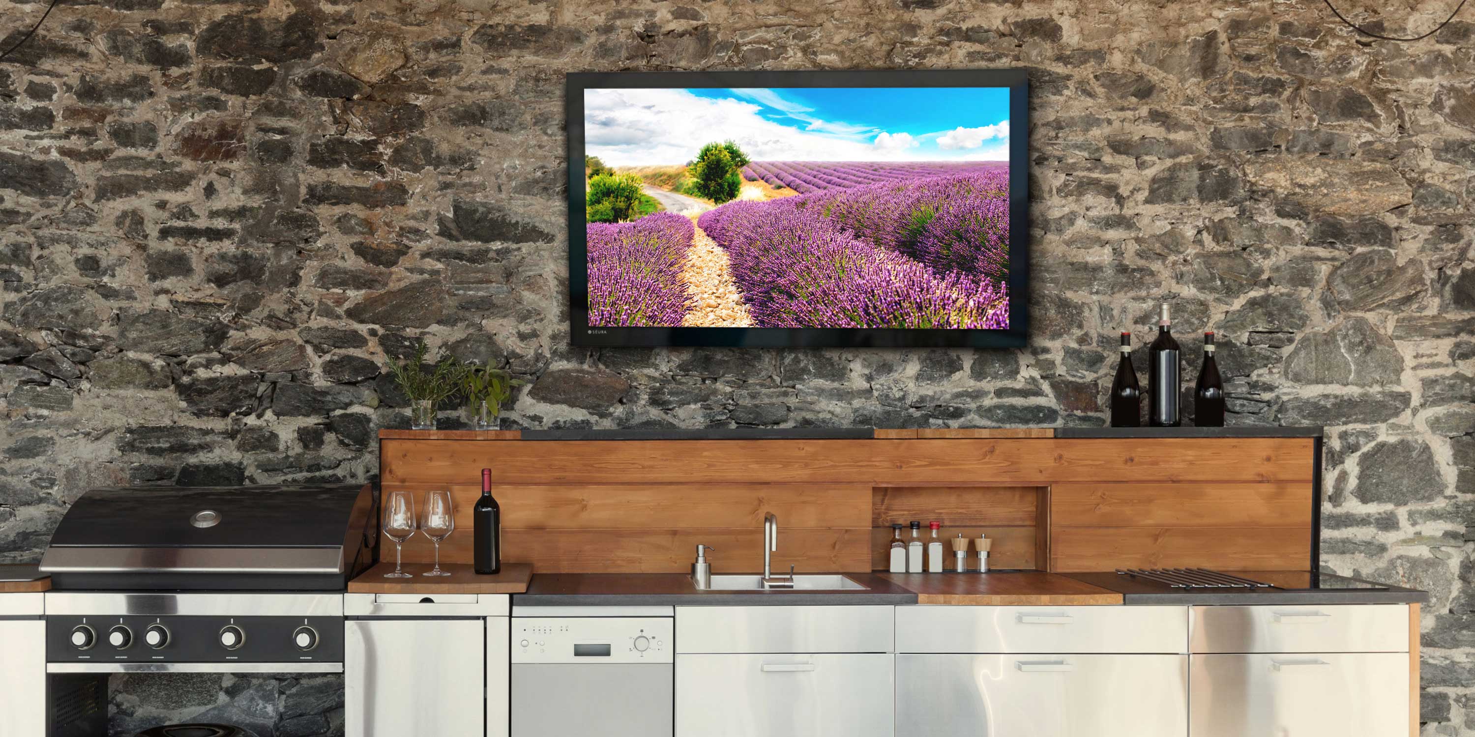 Tv outside over kitchenette