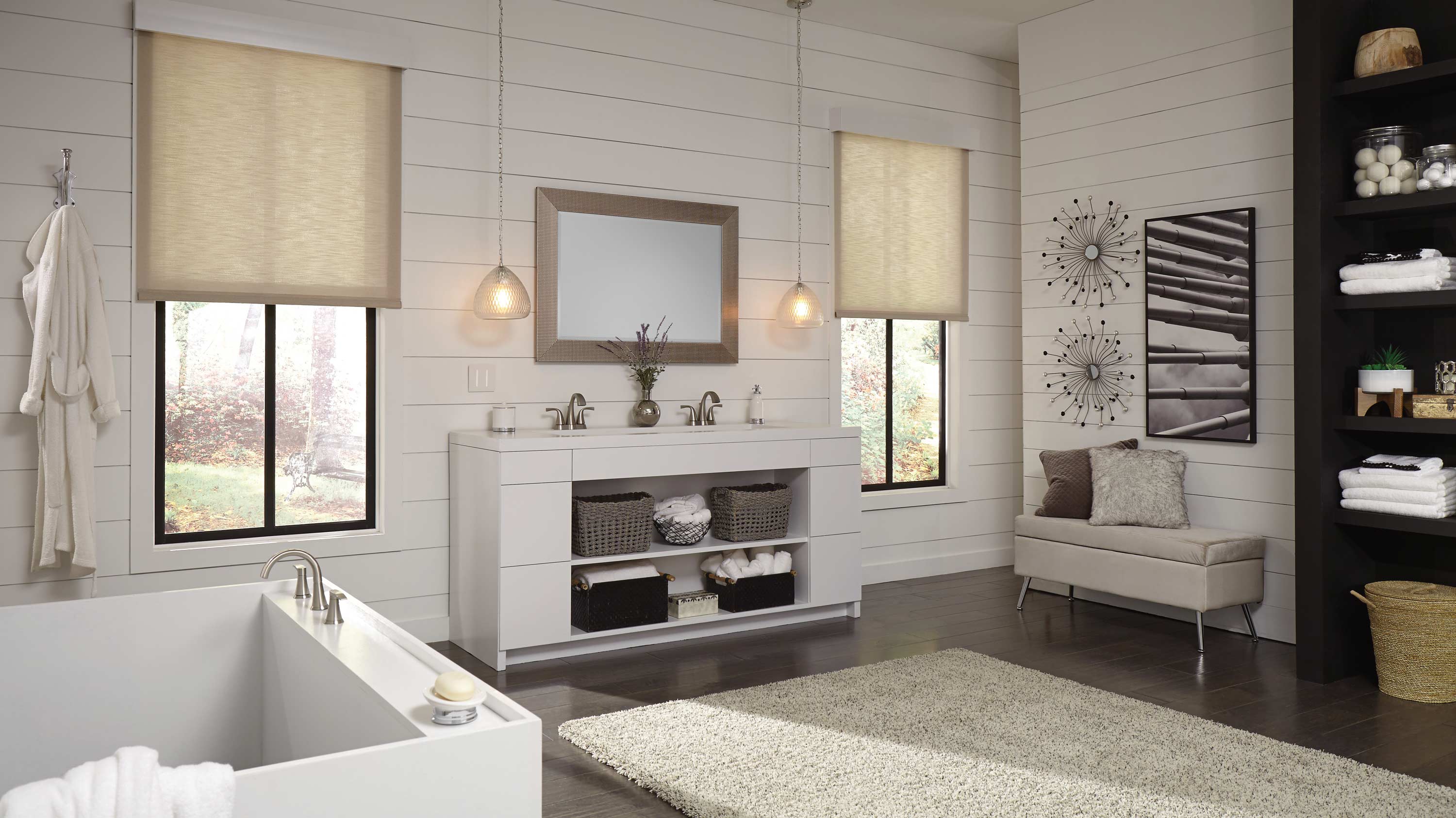 bathroom with motorized shades, black window panes and shag rugs