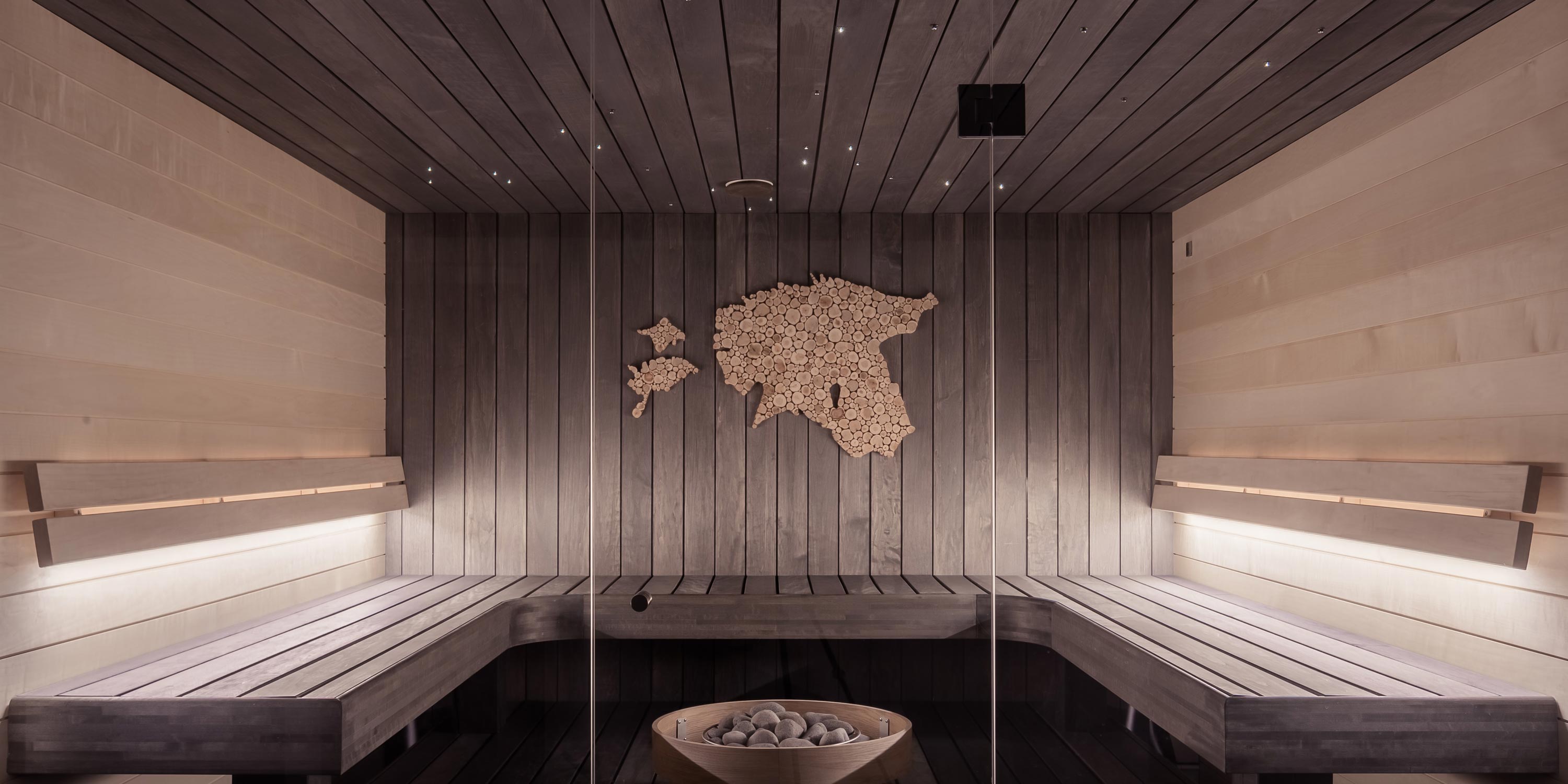 spa with wooden planks and led lighting on ceiling