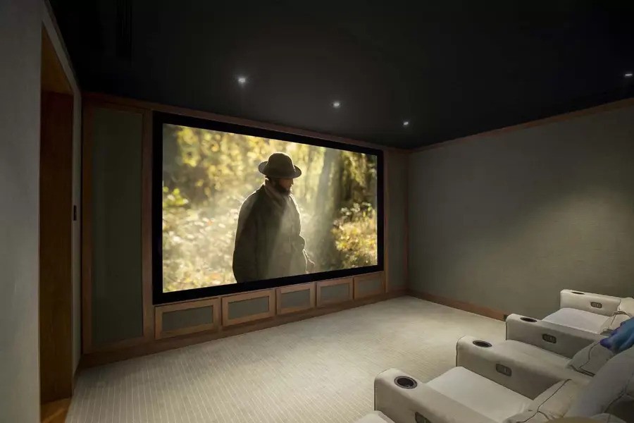 A luxury home theater with minimalist colors and design.