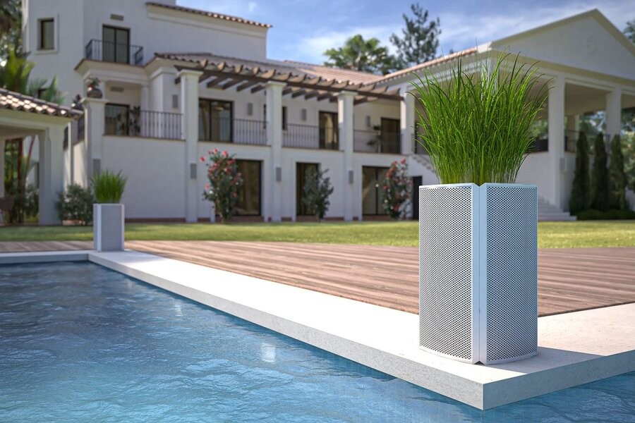 A set of Razor speakers by a luxury pool.