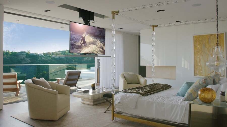 A luxury bedroom with a TV installed in a Future Automation lift.