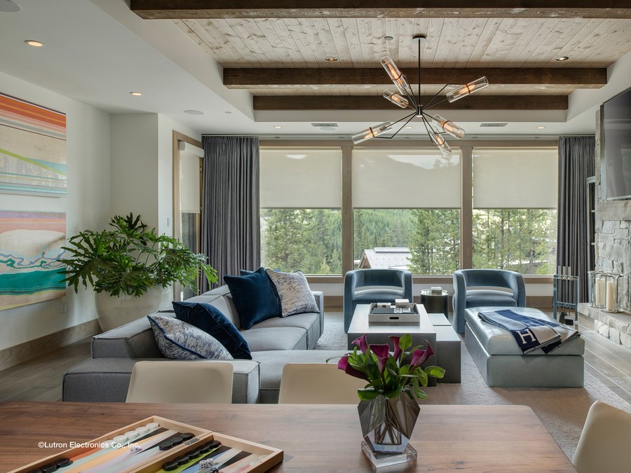 A luxury living room with Lutron roller shades.