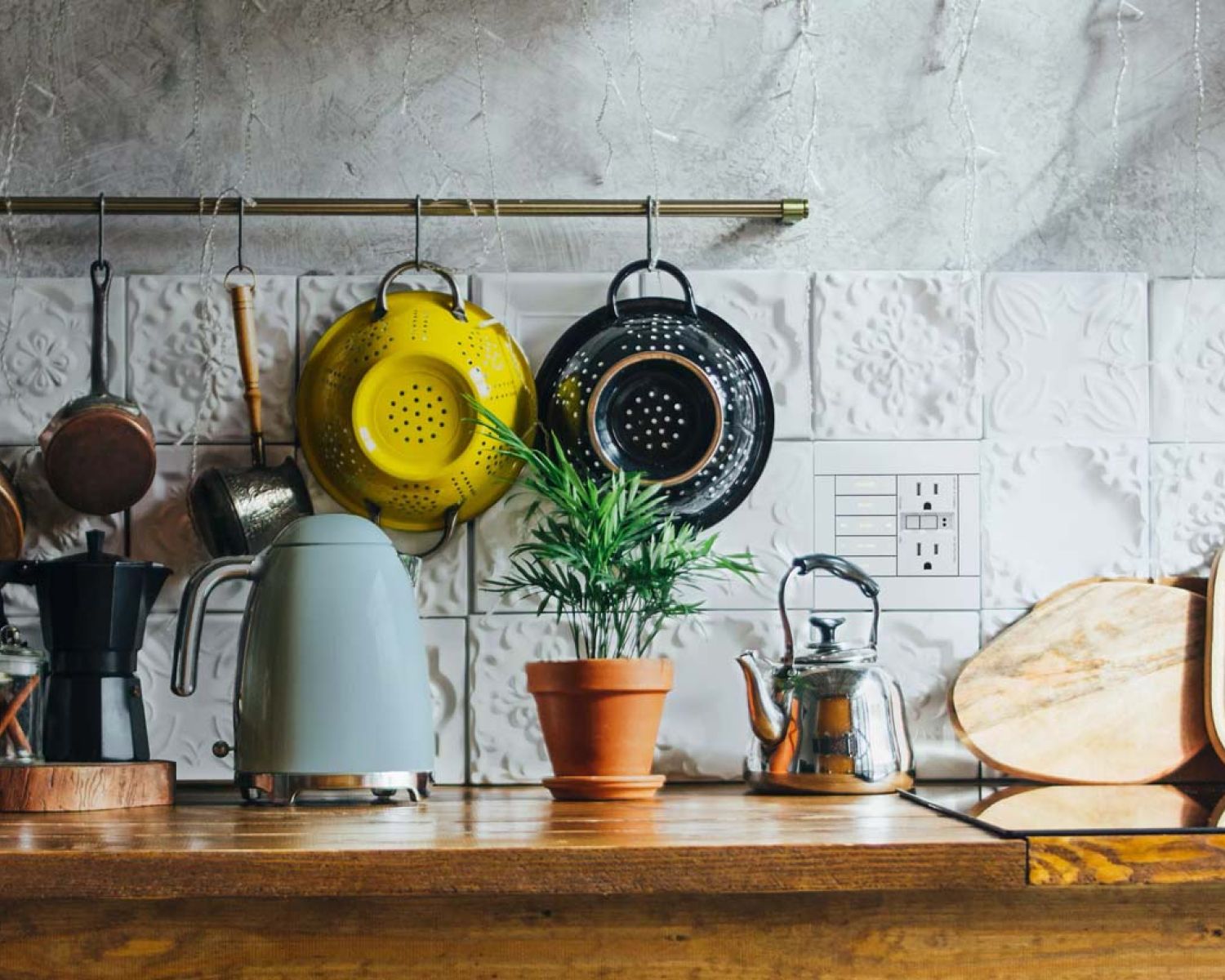 colorful kitchen appliances hanging on wall in kitchen