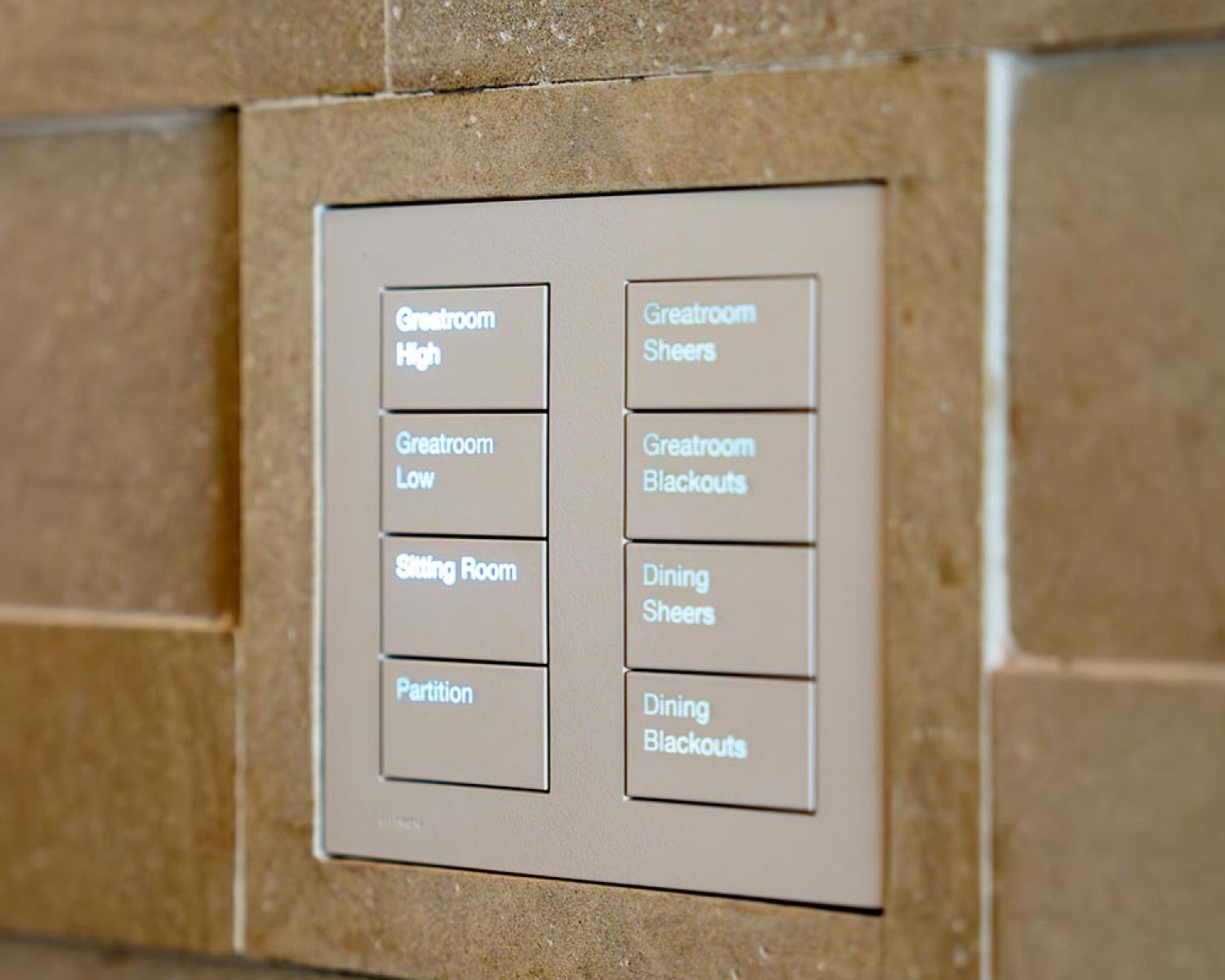 Wall mounted keypad controlling lighting and motorized shades