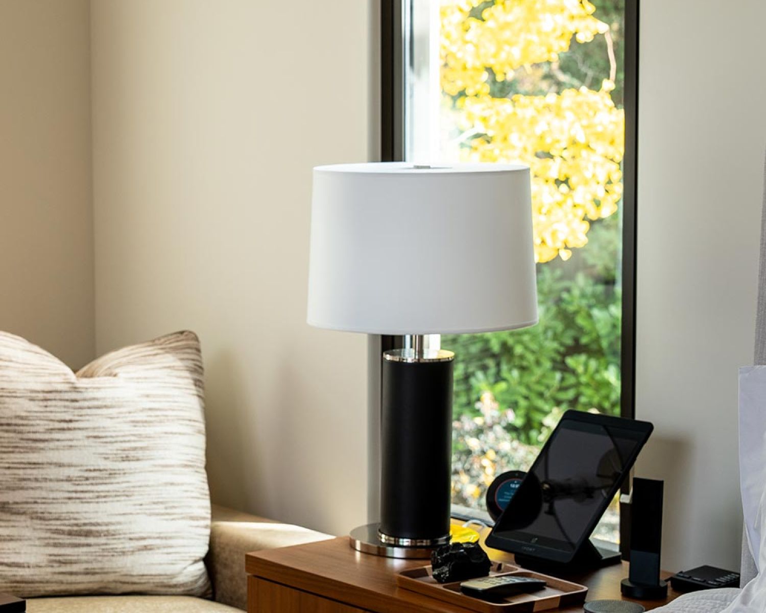Bedroom nightstand with lamp and smart home controls