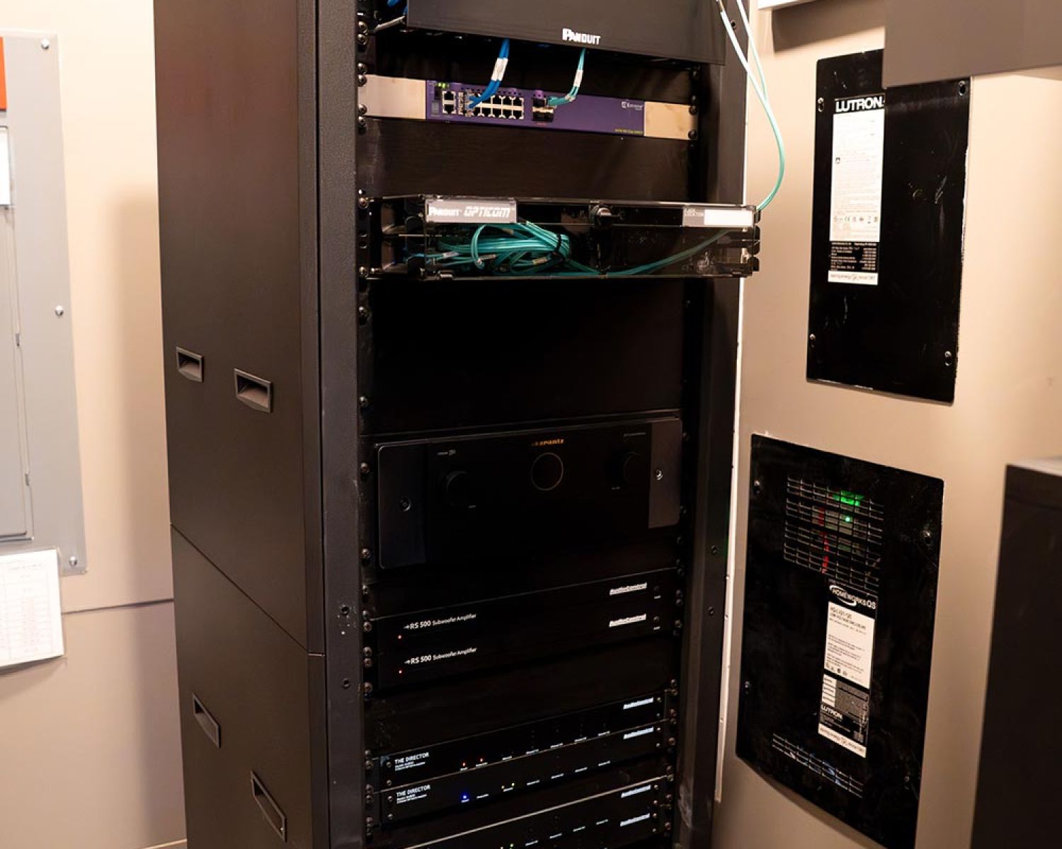 Organized equipment rack with networking and audio components