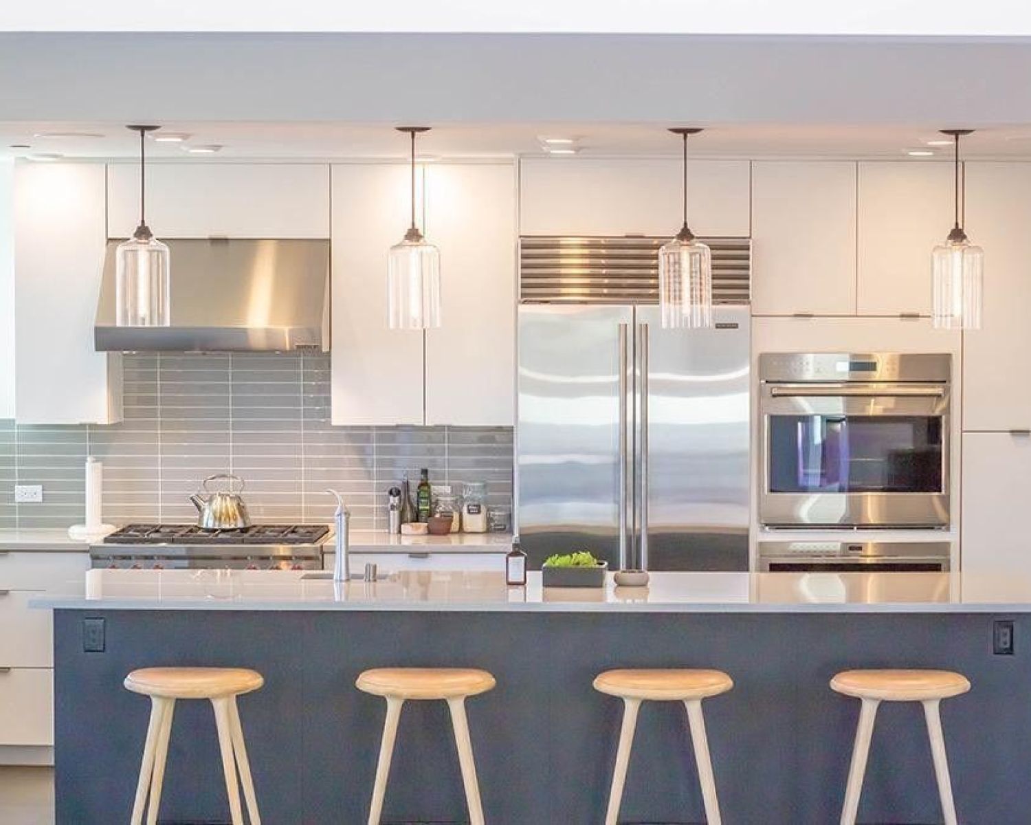 kitchen with barstools beneath island